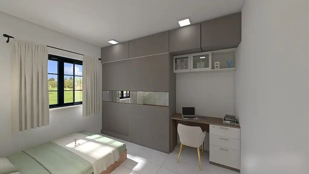 A bedroom with a bed, desk and a chair